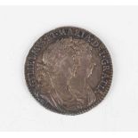 A William and Mary half-crown 1690, first busts, second crowned shield, edge detailed 'Tertio' (