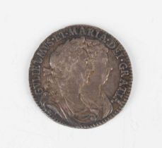 A William and Mary half-crown 1690, first busts, second crowned shield, edge detailed 'Tertio' (