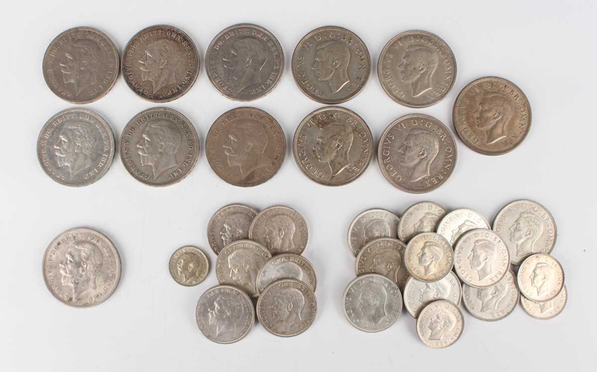 A collection of George V and George VI crowns 1935 and 1937, together with a small group of silver