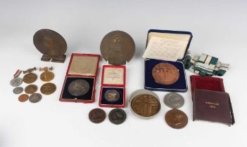 A collection of 19th and 20th century medals and medallions, including a Victoria Diamond Jubilee