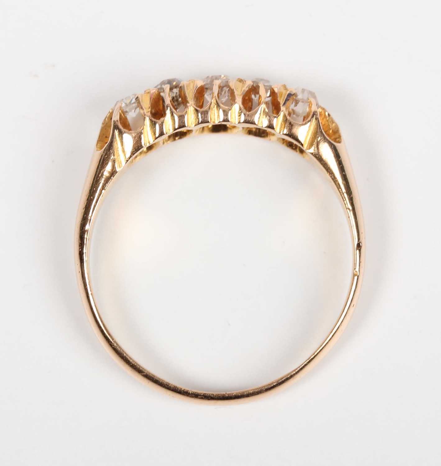 An 18ct gold and diamond five stone ring, mounted with a row of graduated old cut diamonds, London - Image 4 of 5