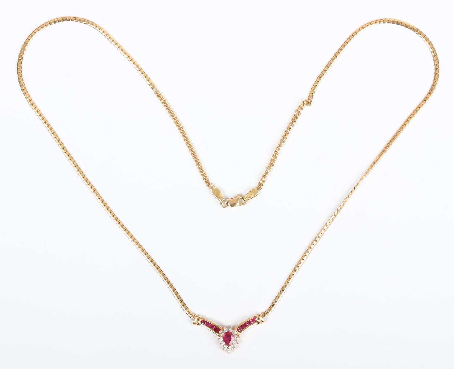 An 18ct gold, ruby and diamond necklace, the front in a ‘V’ shaped design, the principal pear shaped - Image 2 of 3