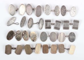 Eight pairs of silver and silver gilt cufflinks in a variety of designs, total weight 59.8g.