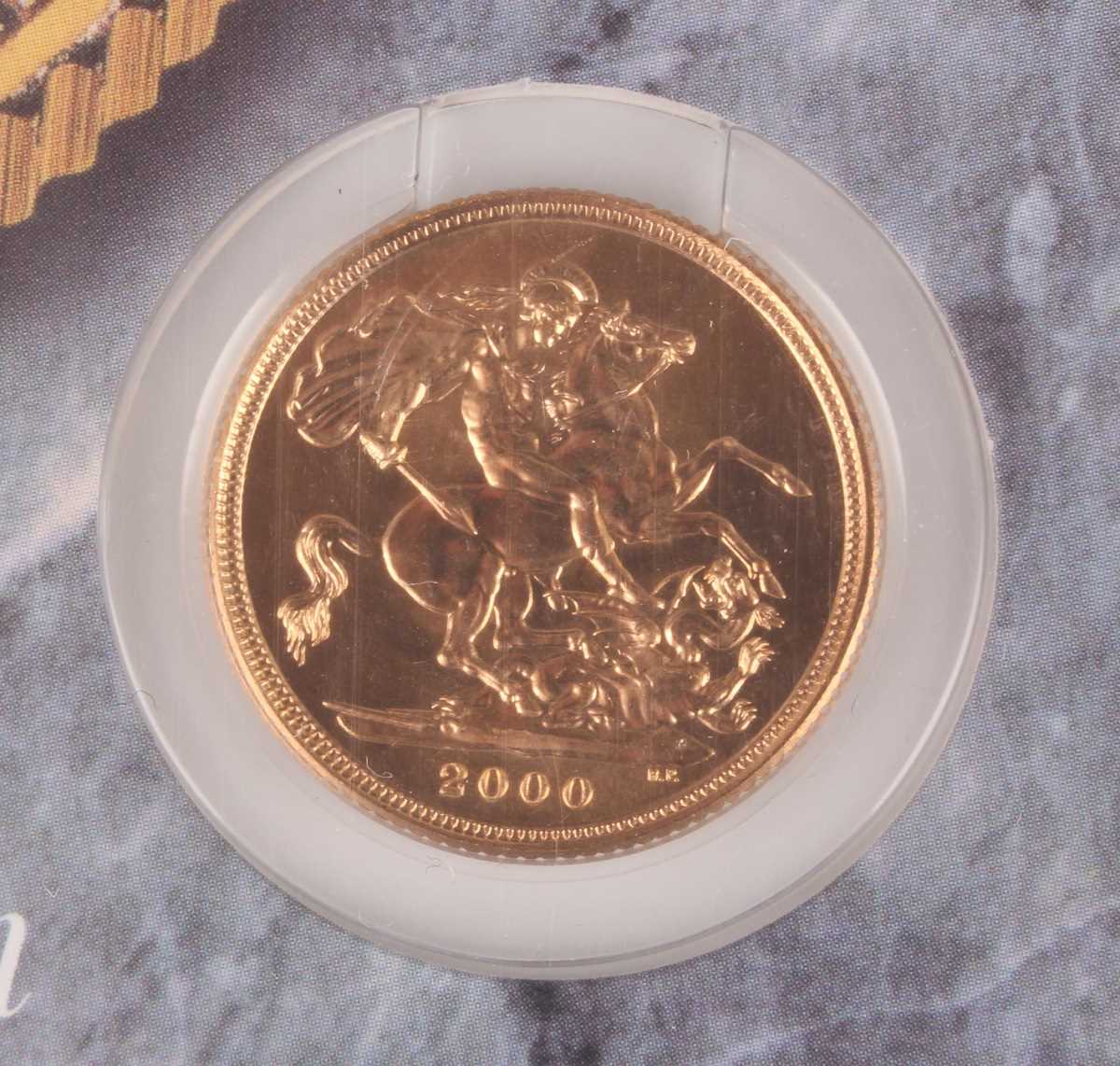 An Elizabeth II Gold Bullion sovereign 2000, mounted within a presentation card gift pack. - Image 2 of 2