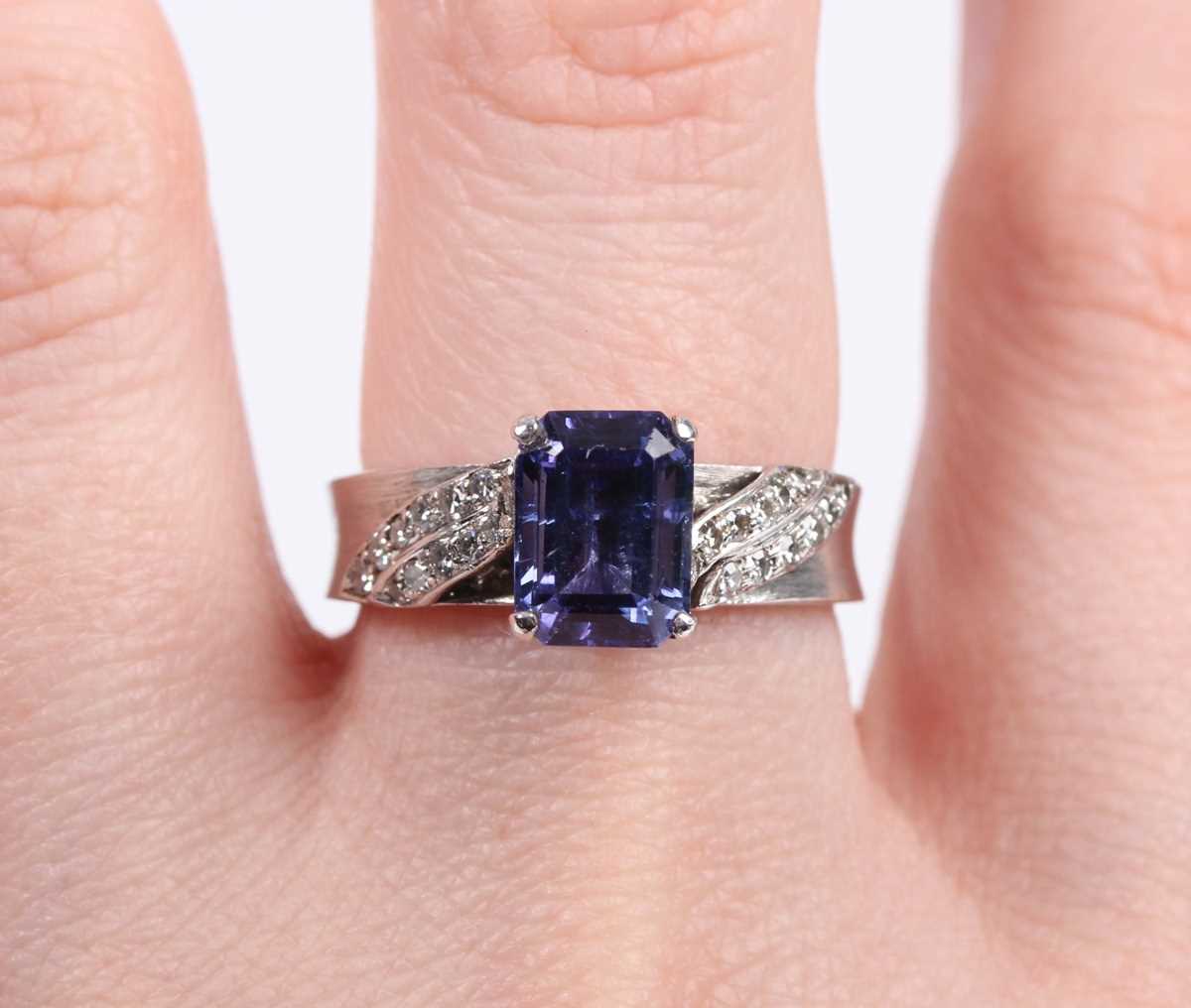 A white gold, tanzanite and diamond ring, claw set with the cut cornered rectangular tanzanite - Image 10 of 10