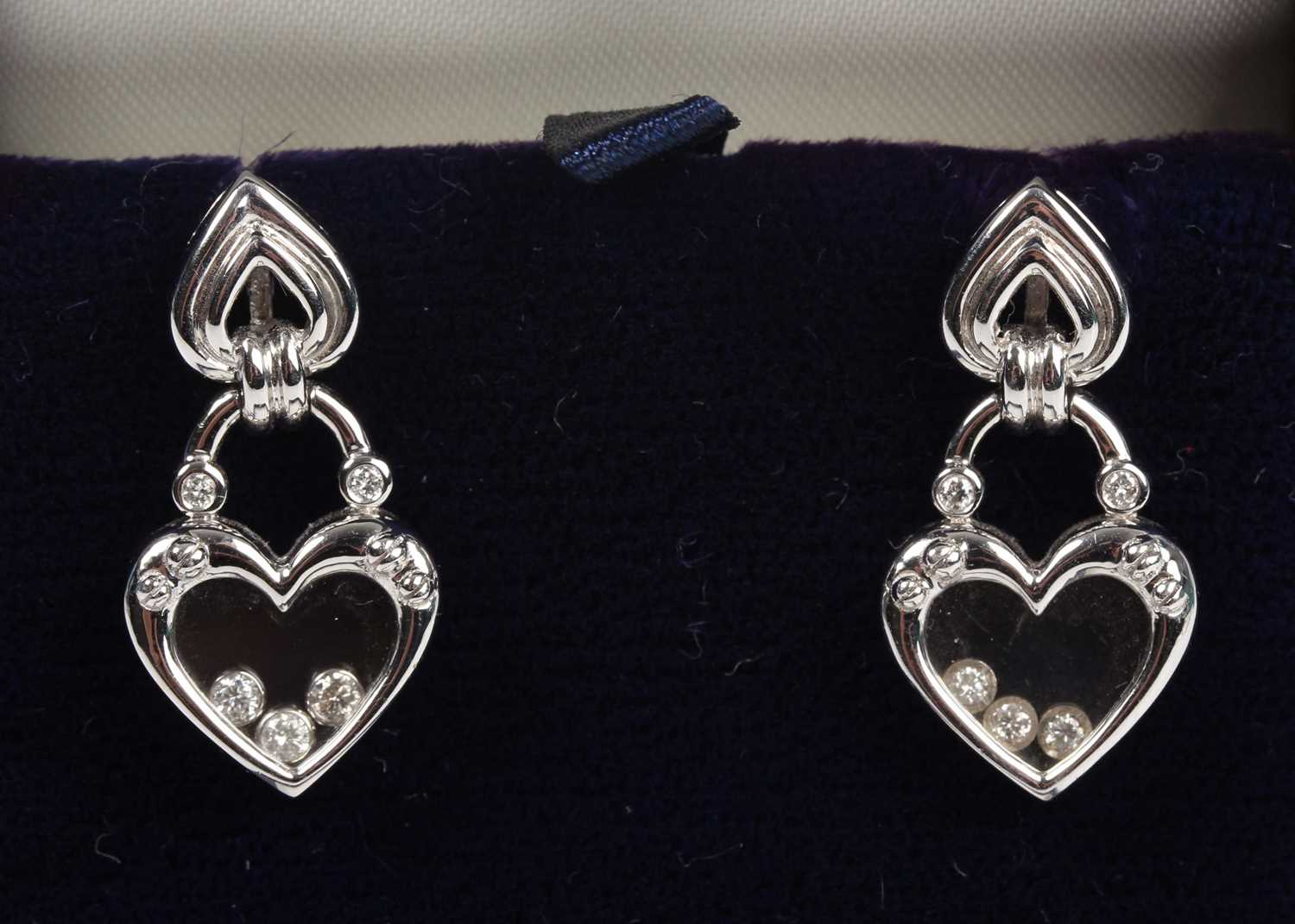 A pair of 18ct white gold and diamond pendant earrings, each designed as a stylised heart shaped - Image 3 of 3