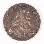 A Charles I death and memorial silver medal 1649 by J. Roettier, obverse with armoured bust, reverse