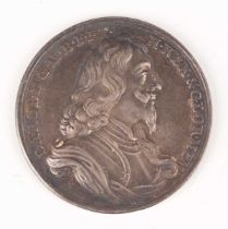A Charles I death and memorial silver medal 1649 by J. Roettier, obverse with armoured bust, reverse