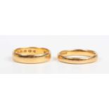 A Victorian 22ct gold wedding ring, London 1882, ring size approx M1/2, and another 22ct gold