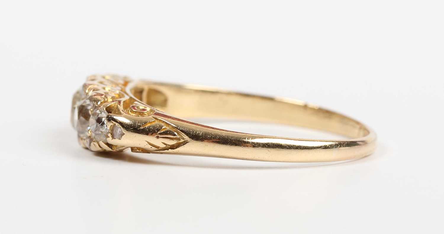 A gold and diamond five stone ring, mounted with a row of old cut diamonds graduating in size to the - Image 3 of 5
