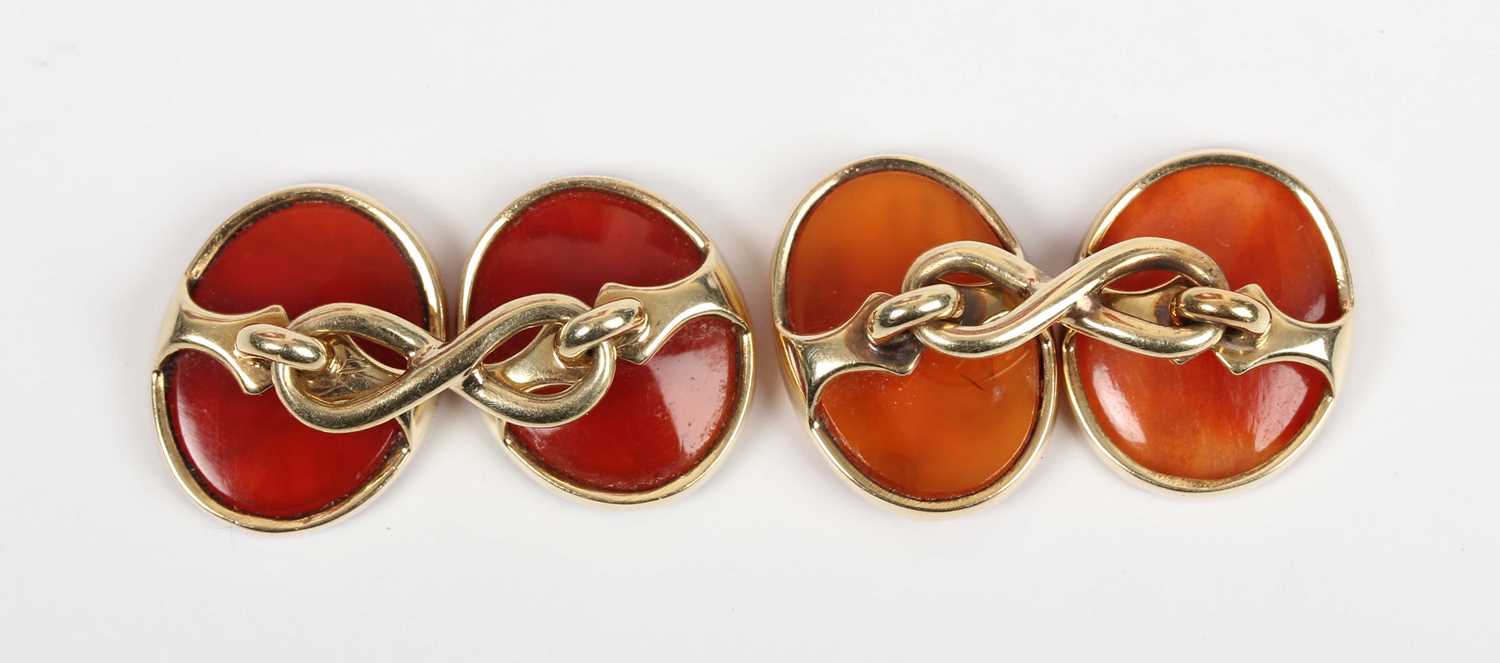 A pair of gold and cornelian intaglio oval cufflinks, each carved with a classical motif, - Image 2 of 6