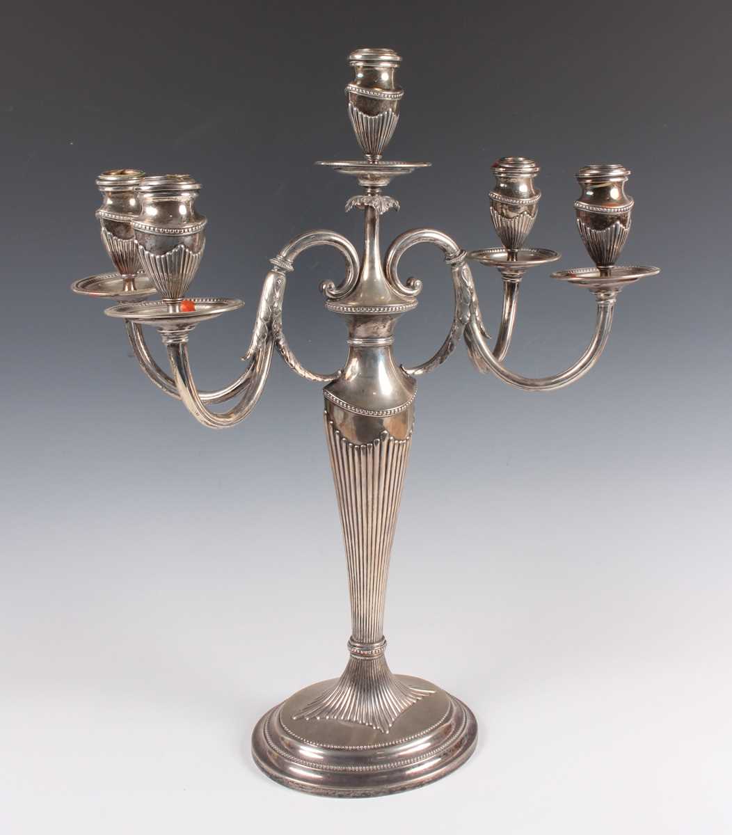 An early 20th century German .800 silver five-light four-branch candelabrum by M.H. Wilkens & Sohne,