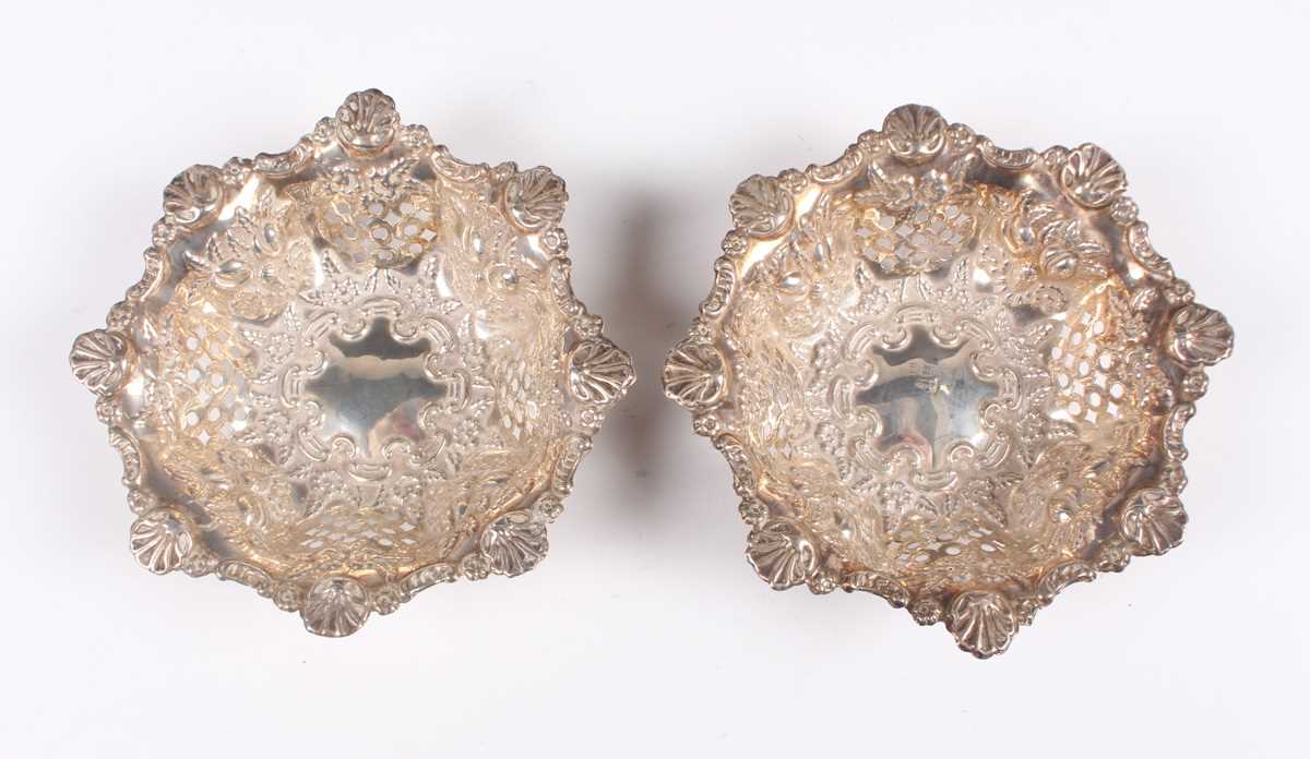 A pair of late Victorian silver circular lobed bonbon dishes, pierced and embossed with fruit - Image 2 of 11