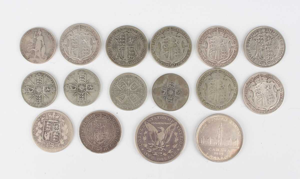 A collection of British and world coinage, including a Canada dollar 1939, a USA dollar 1879 and a - Image 3 of 3