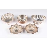 A pair of late Victorian silver circular lobed bonbon dishes, pierced and embossed with fruit