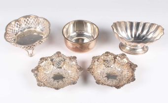 A pair of late Victorian silver circular lobed bonbon dishes, pierced and embossed with fruit