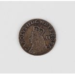 A Charles II third issue penny, mintmark crown (extremely fine, toned with some rainbowing).