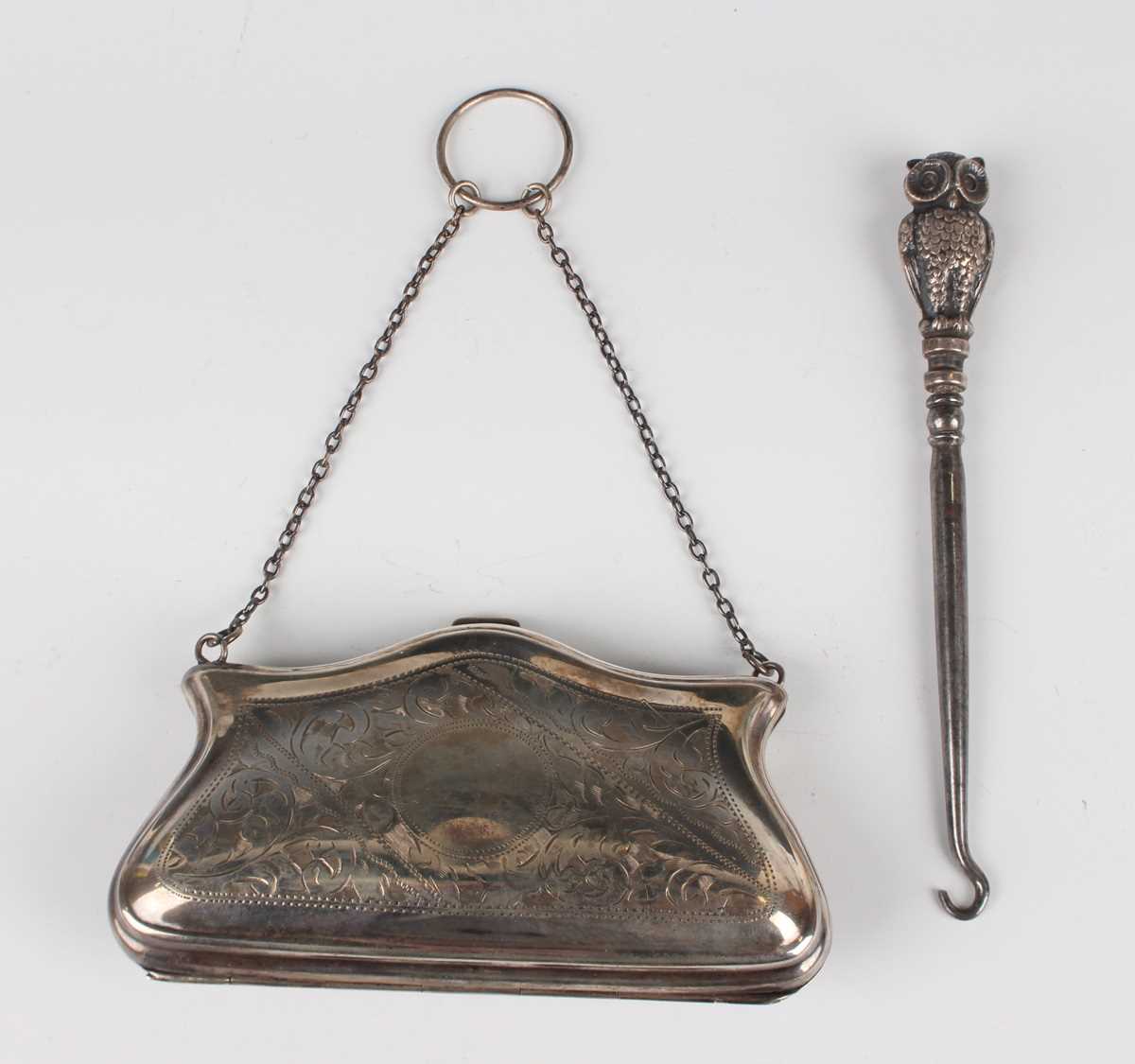 An Edwardian silver handled and steel buttonhook in the form of a double-sided owl, Birmingham