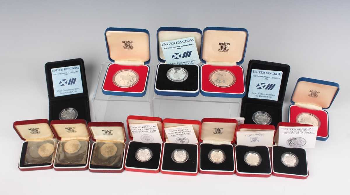 A collection of various Elizabeth II Royal Mint silver proof coins, including a piedfort one pound