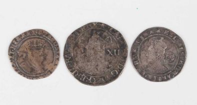 An Elizabeth I sixpence 1575, mintmark eglantine, a Charles I shilling, mintmark star, and a James I