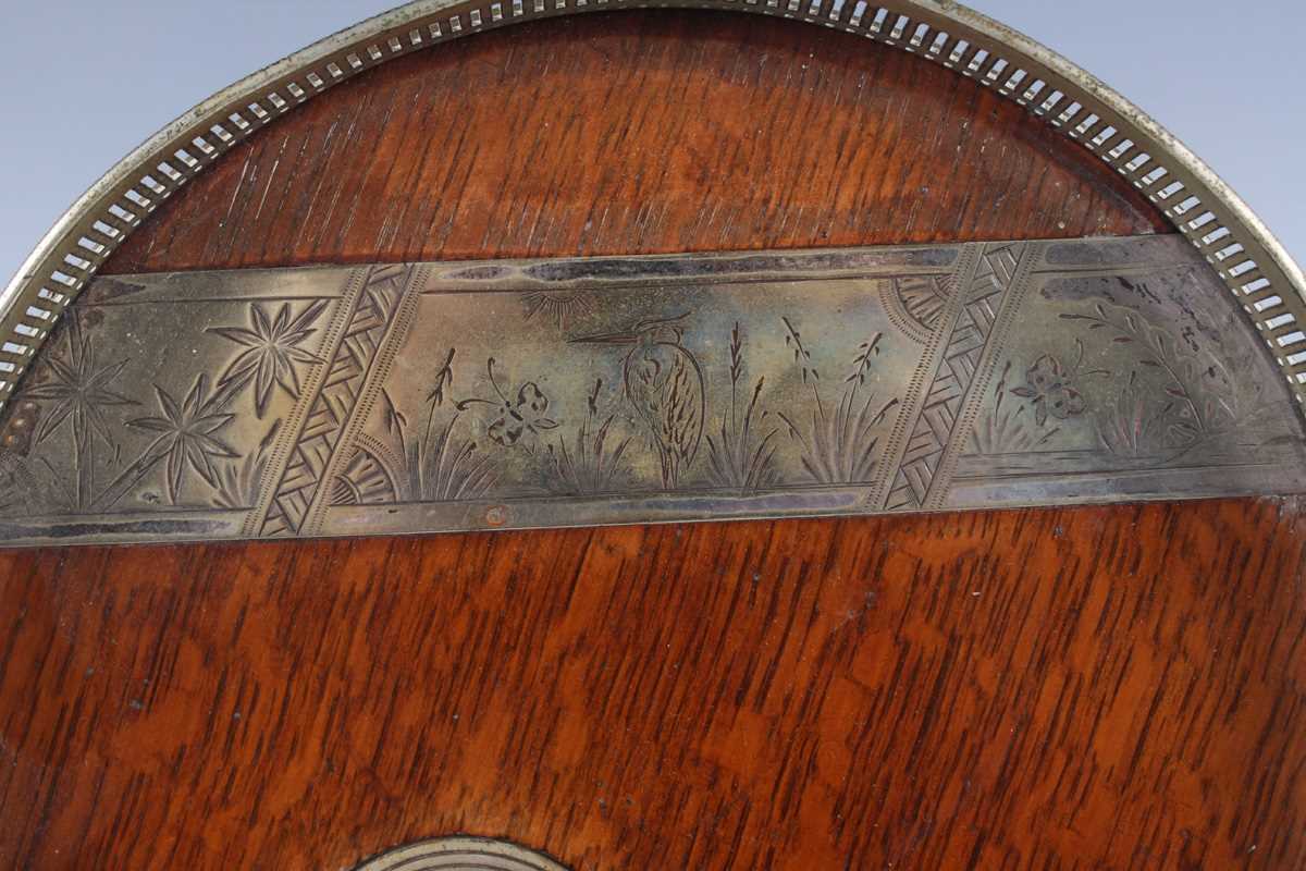 A late Victorian plate mounted circular tray, the oak base inset with a circular plaque beneath an - Image 3 of 7