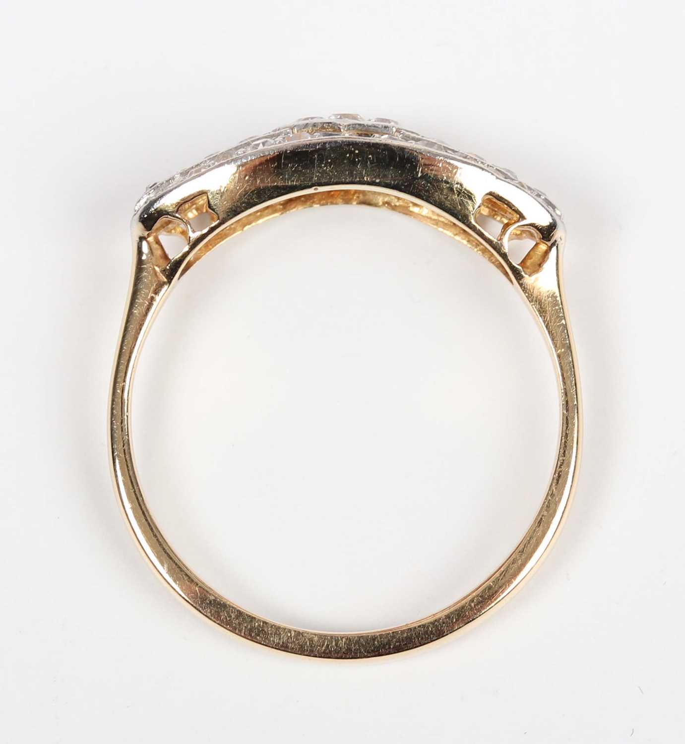 A gold and diamond ring in an oval panel shaped design, mounted with circular cut diamonds, - Image 4 of 5