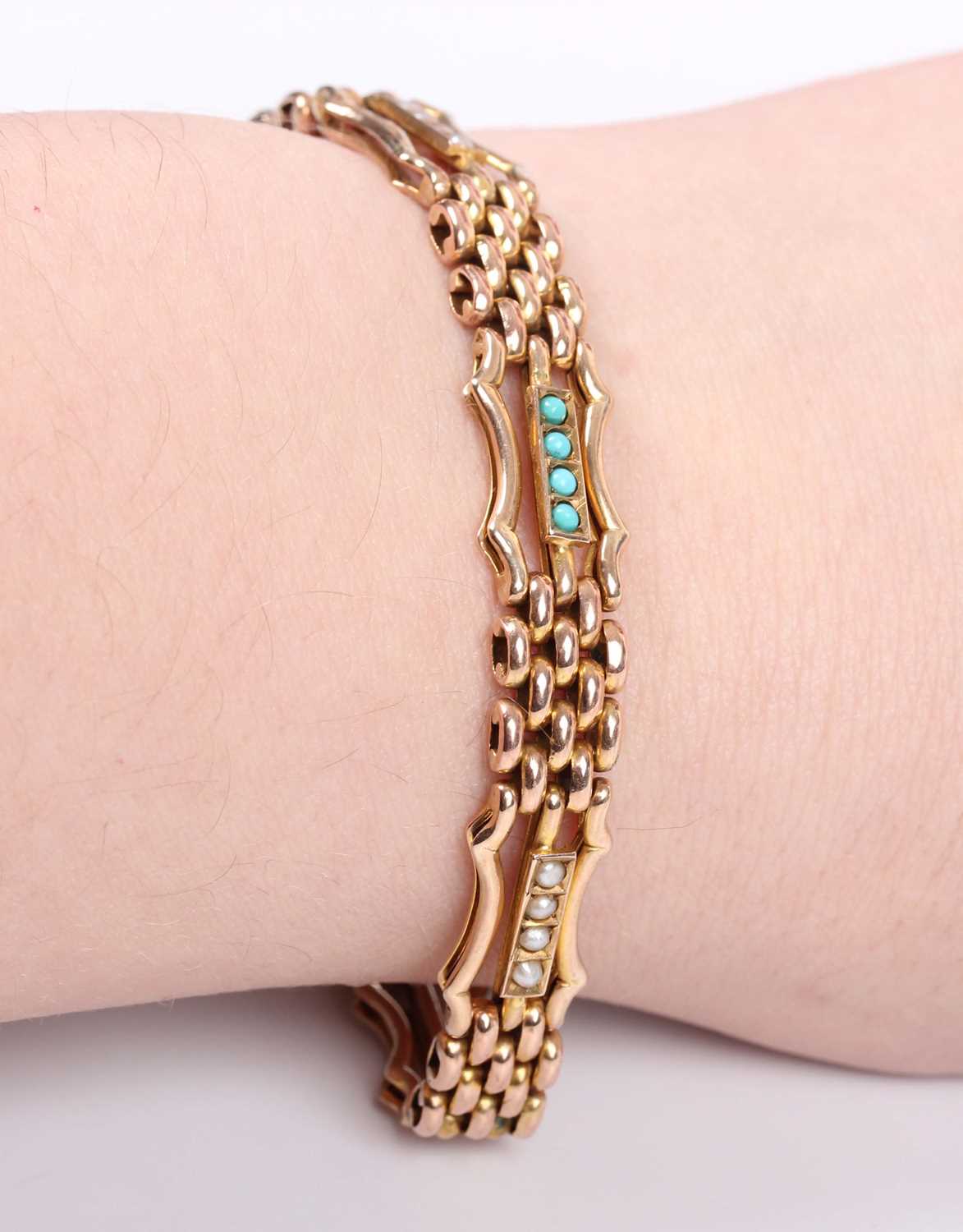 A gold, turquoise and seed pearl bracelet in an oval and curved bar link design, on a snap clasp, - Image 4 of 4