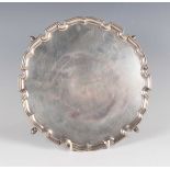 A George VI silver salver with piecrust rim, London 1938 by the Goldsmiths & Silversmiths Co Ltd,