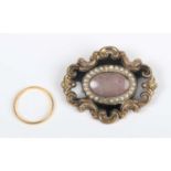 A 22ct gold wedding ring, Birmingham 1949, weight 2.2g, ring size approx R, and a Victorian mourning