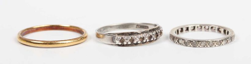 A 22ct gold wedding ring, Birmingham 1948, weight 2.5g, ring size approx S1/2, a colourless gem
