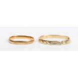An Egyptian gold and diamond band ring, weight 2.1g, and a gold wedding ring, detailed ‘22ct’,