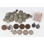 A small collection of coins, including a group of pre-1947 British silver and silver nickel coinage,