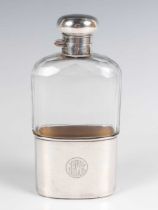 An Edwardian silver mounted faceted cut glass hip flask with detachable cup, London 1904 by