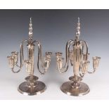 A pair of early 20th century German silver six-branch candelabra by M.H. Wilkens & Sohne, each