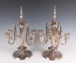 A pair of early 20th century German silver six-branch candelabra by M.H. Wilkens & Sohne, each