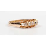 An 18ct gold and diamond five stone ring, mounted with a row of graduated old cut diamonds, London