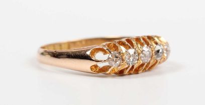 An 18ct gold and diamond five stone ring, mounted with a row of graduated old cut diamonds, London