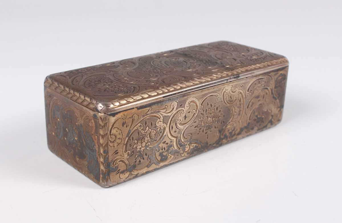 A 19th century French silver and parcel gilt rectangular snuff box, engraved with flowers and - Image 2 of 10