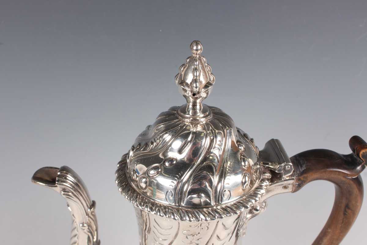 A George III silver baluster coffee pot with domed hinged lid and seed head finial above half-spiral - Image 2 of 4