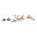 A 9ct gold and seed pearl brooch with a naval crown motif, weight 2.3g, width 2.4cm, a pair of