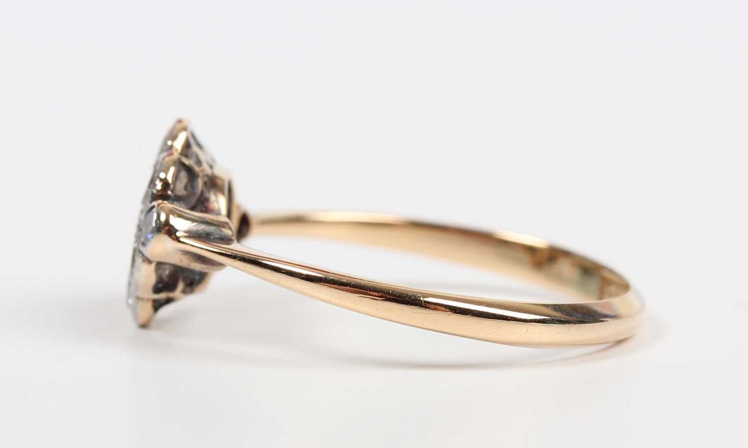 A gold, platinum and diamond nine stone cluster ring in a lozenge shaped design, mounted with - Image 3 of 5