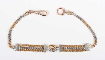 A gold and platinum bracelet, the front in a three row curblink design with a central knot shaped