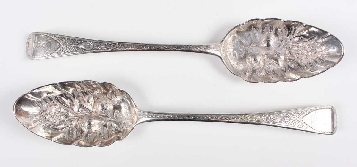 Two George III silver Old English pattern tablespoons, both later embossed and bright-cut engraved - Image 2 of 9