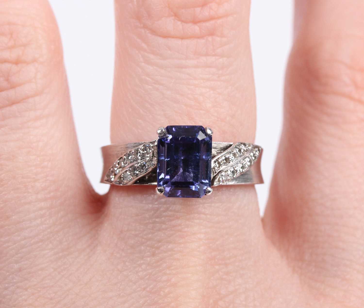 A white gold, tanzanite and diamond ring, claw set with the cut cornered rectangular tanzanite - Image 5 of 10