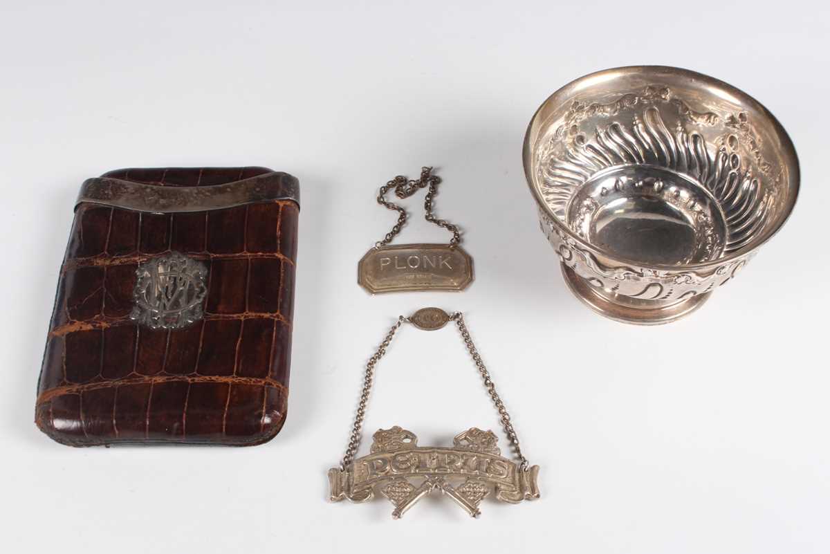 An Elizabeth II 'The Hugh Johnson Collection' silver cast decanter label, designed as the Pétrus