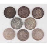 A collection of various crowns, including two George III, 1819 and 1820, George IV 1821 and three