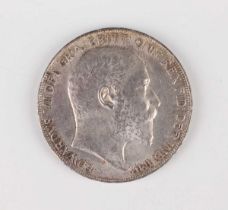 An Edward VII crown 1902, edge detailed 'II'.