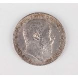 An Edward VII crown 1902, edge detailed 'II'.