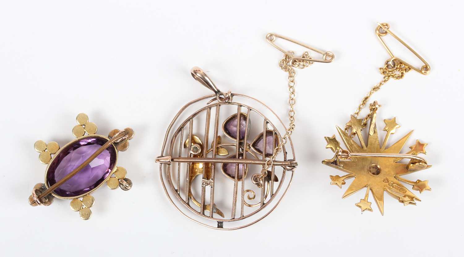 A gold, amethyst and seed pearl pendant brooch in a circular design with a trefoil and spray - Image 2 of 3