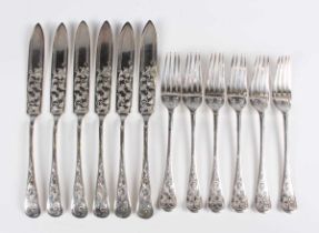A set of six late Victorian silver Old English pattern fish knives and forks, engraved with